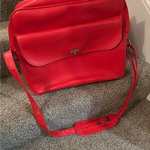 Sears Red Travel Bag with Adjustable Strap and Flap Closure